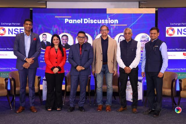 Panel discussion on stage at COMCLAVE Pune